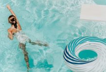 Royal style bathroom with freestanding bath and ceramic floors